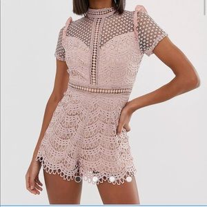 Love Triangle high neck cutwork lace romper in pink